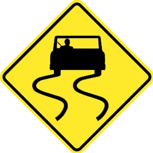 Road sign: When pavement is wet, reduce your speed.