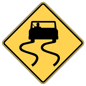 Road sign: Slippery when wet.