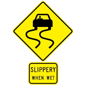 Road sign: Slippery when wet.