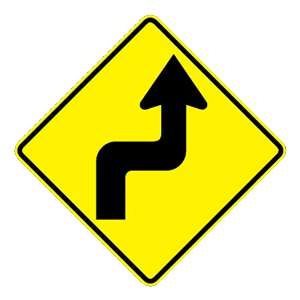 Road sign: The road ahead turns sharply right, then left.