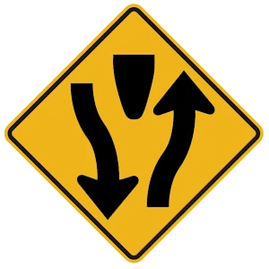 Road sign: A divided highway begins.