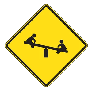 Road sign: Playground nearby.