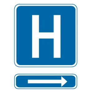Road sign: Hospital ahead and to the right.