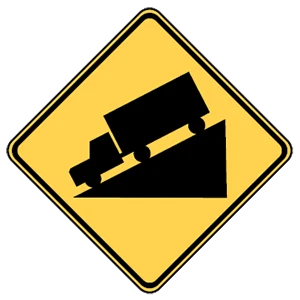 Road sign: Steep hill ahead.