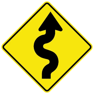Road sign: Winding road.