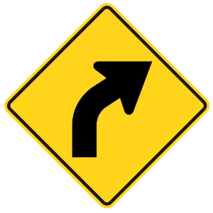Road sign: Road curves ahead.