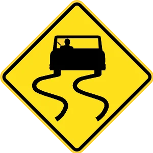 Road sign: The road ahead may be slippery.
