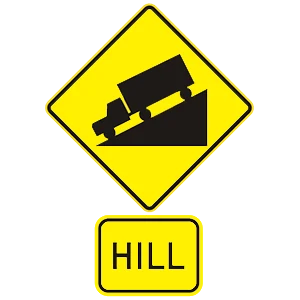Road sign: Upcoming hill.