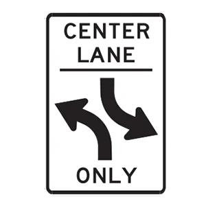 Road sign: Two-way left turn.
