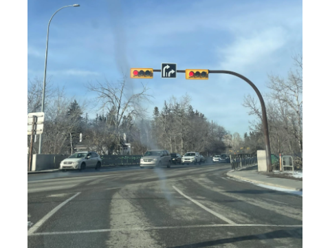 Is a driver permitted to turn right on a red traffic light?